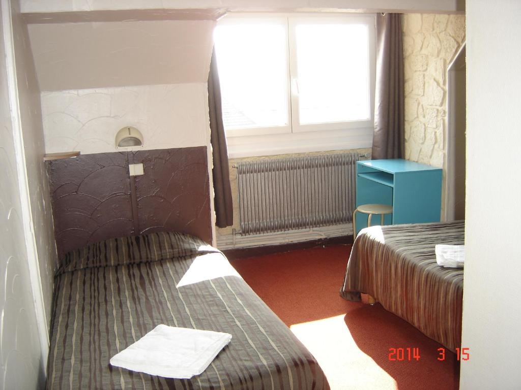 Hotel Metropole Condette Quarto foto